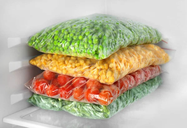 depositphotos 133980720 stock photo bags with frozen vegetables in